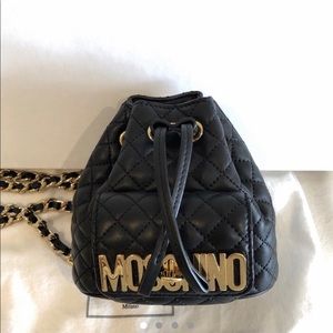 Authentic mini quilted moschino backpack.